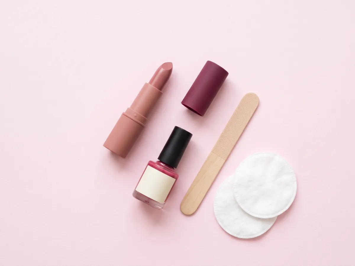 Everyday makeup and nail care essentials flat-lay